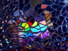 mosaic disco ball with rainbow reflection