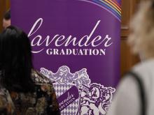 Attendees line up to check in at Lavender Graduation