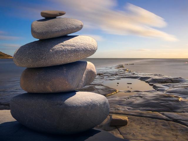 Photo of a stack of rocks balanced