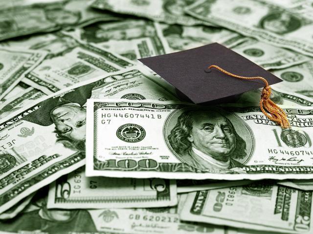 Photo of money and a graduation mortar board