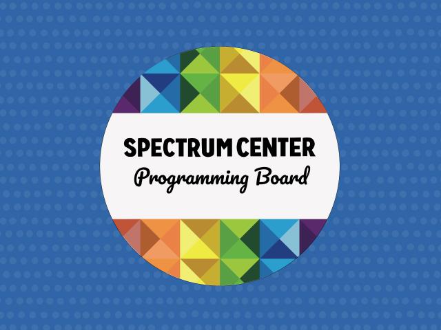 Spectrum Center Programming Board on a small decorative badge