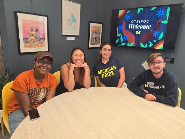 Photo of students around the table in Spectrum Center