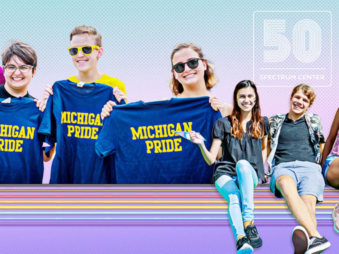 Students celebrating Pride and the Spectrum 50th Anniversary logo